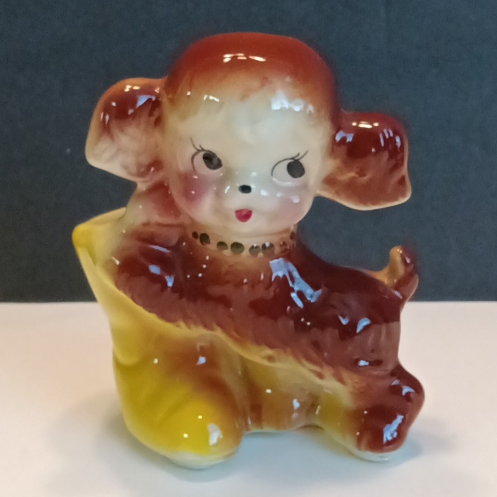 Vintage puppy and shoe planter